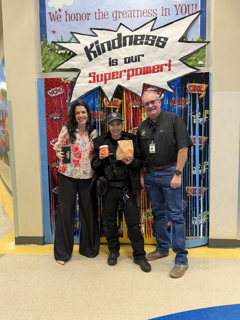 superintendent and director of security posing with school resource officer and whataburger!