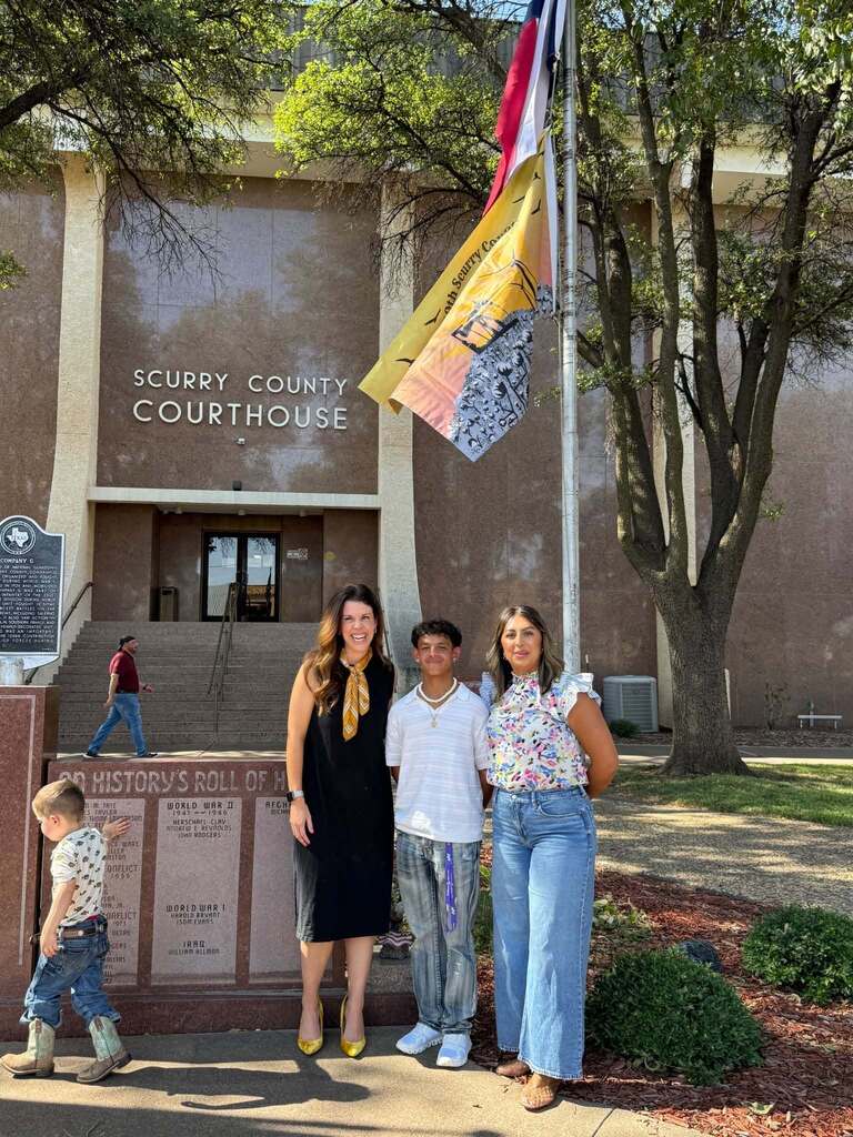 standing in front of courthouse
