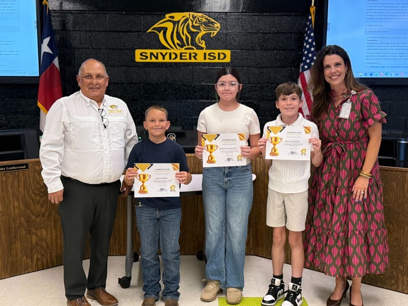 staff and students posting with certificates