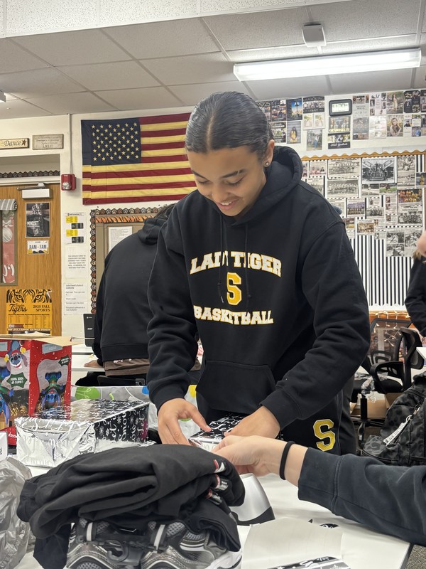 student wrapping present