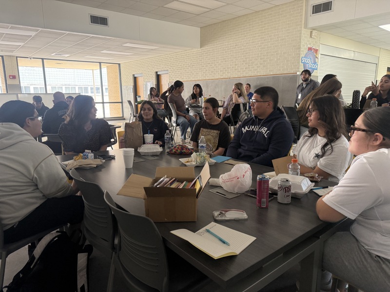 students and staff learning at lunch