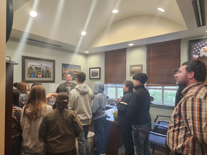 students visiting with staff
