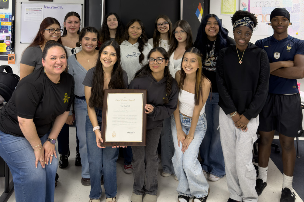 Group photo of El Dorado yearbook team with award