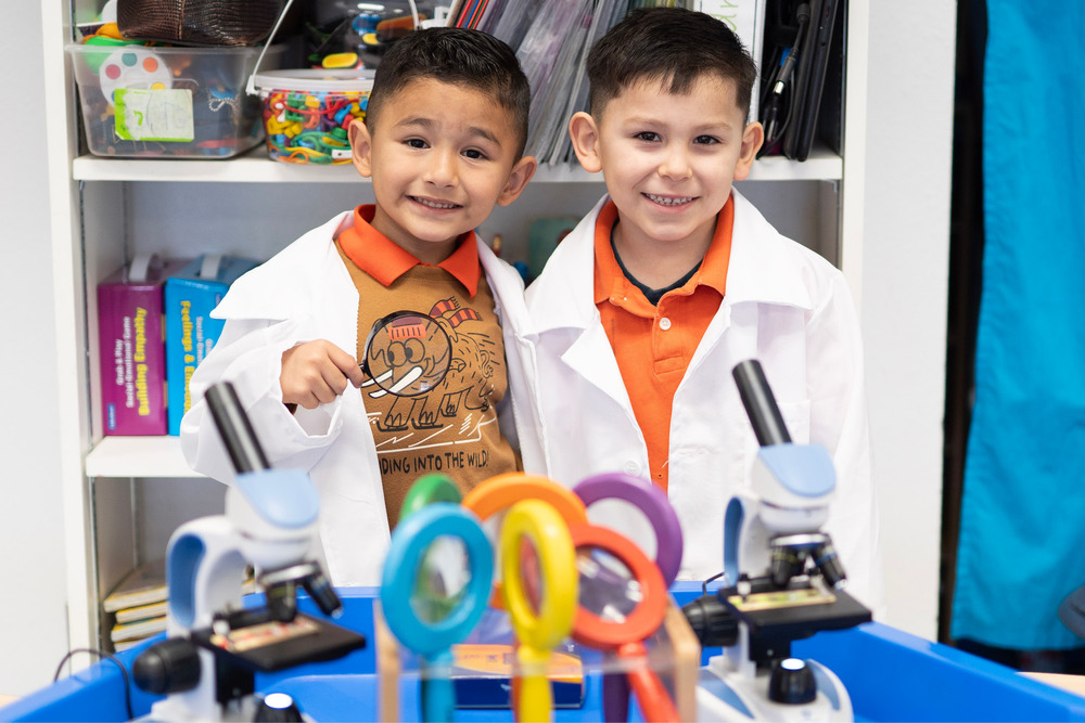 Pre-K students doing science activities