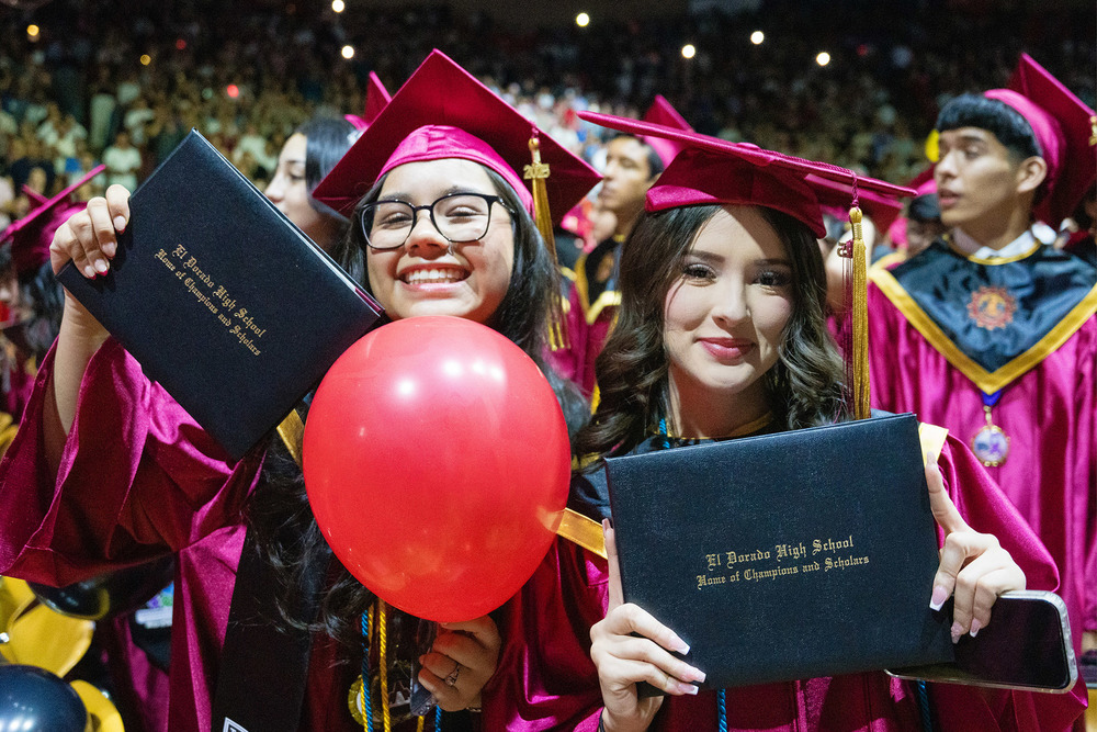 Graduates smiling