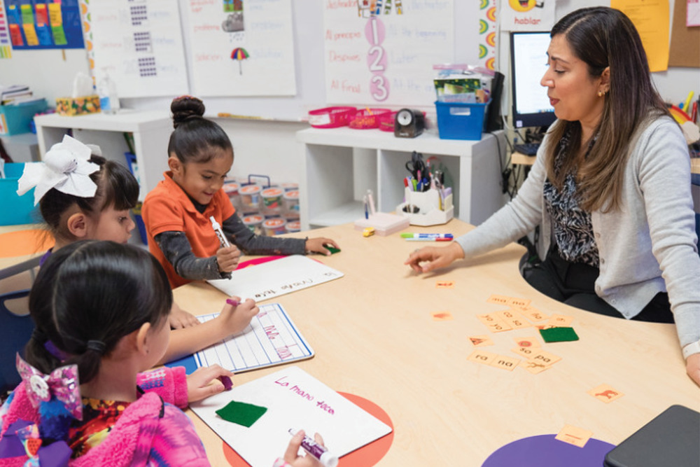 Teacher instructing students