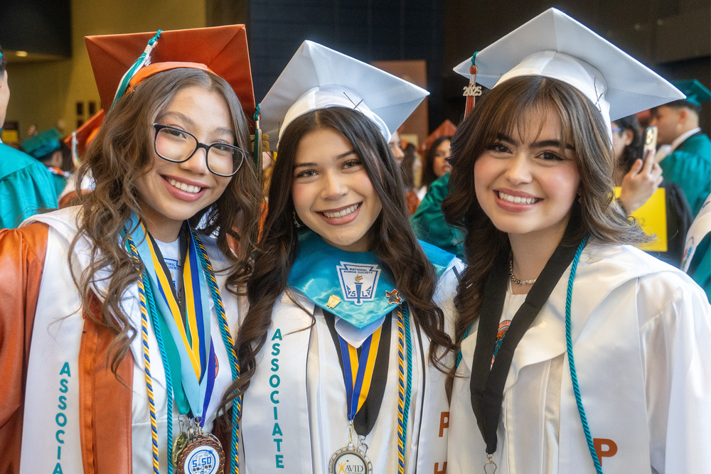 Graduates smiling
