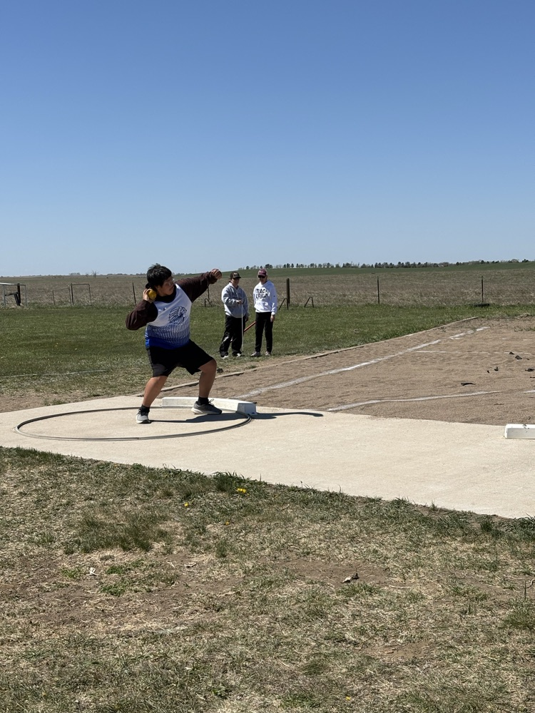 Hank Fast Horse throwing shot put