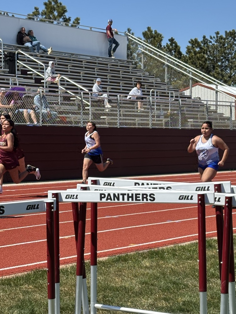 Kaylee Harrison and Isabella See Walker in the 100m dash