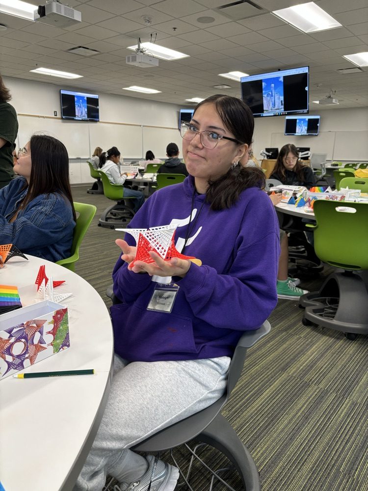Brayleigh creating an anti-prism using her HyperTiles