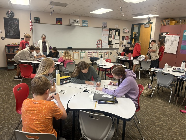 8th grade reviewing scientific notation 