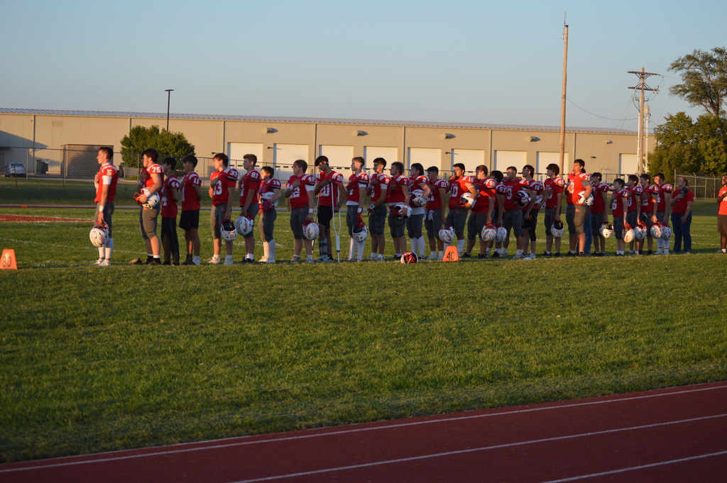 solomon players standing for national anthem