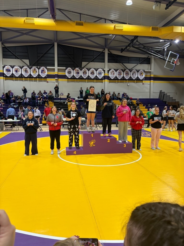 Maddy Suderman at podium