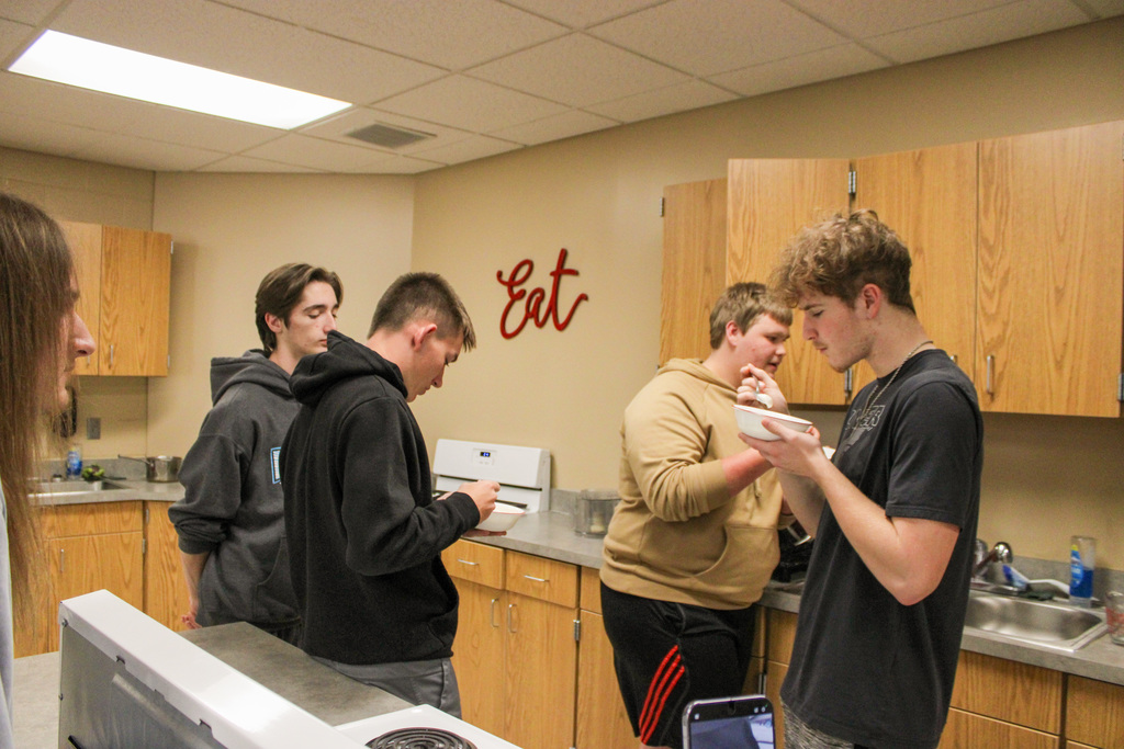 students tasting their culinary creation