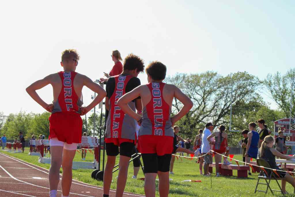 three solomon students wearing branded jerseys