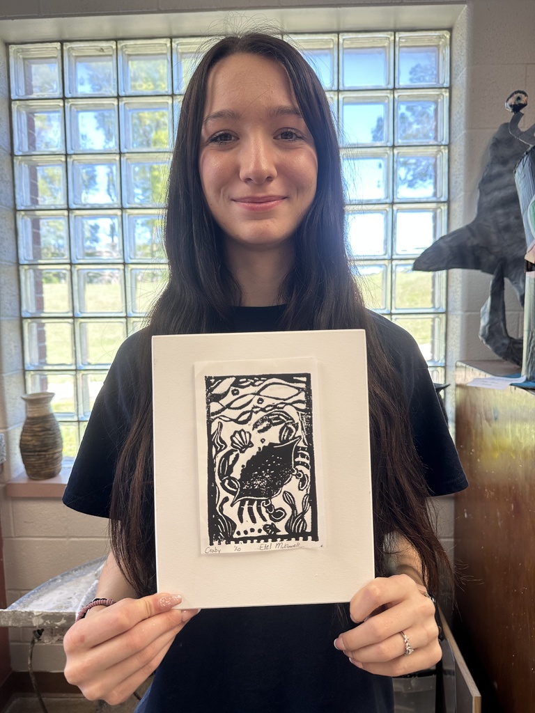 student showcaing art