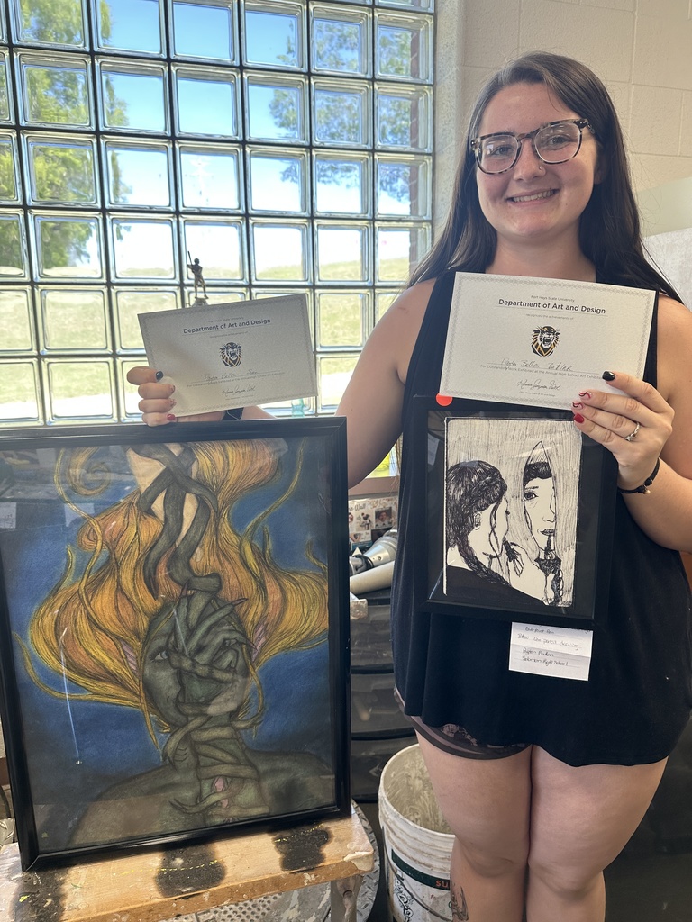 student showcaing art