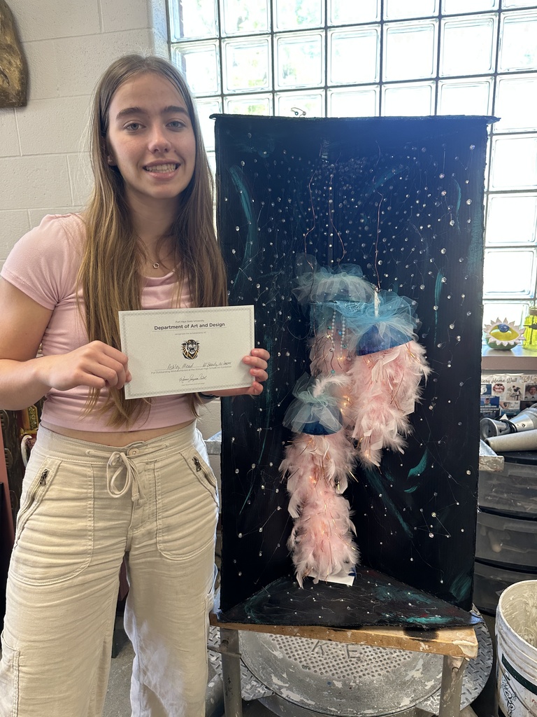 student showcaing art