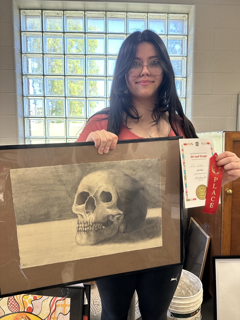 student showcaing art