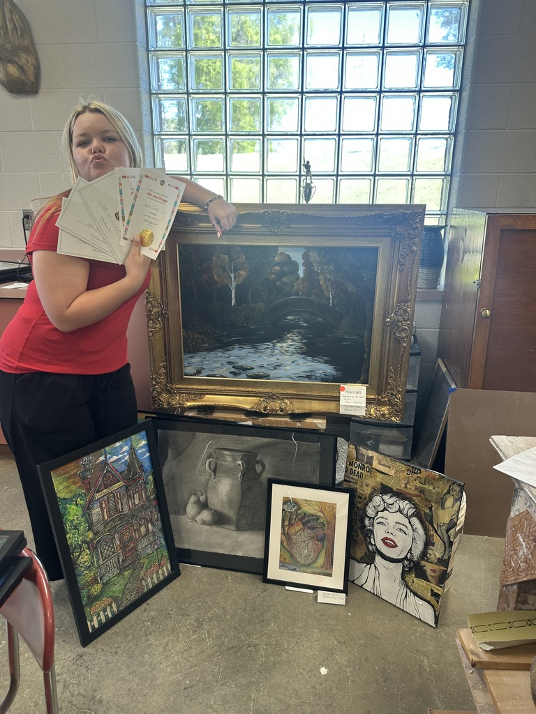 student showcaing art