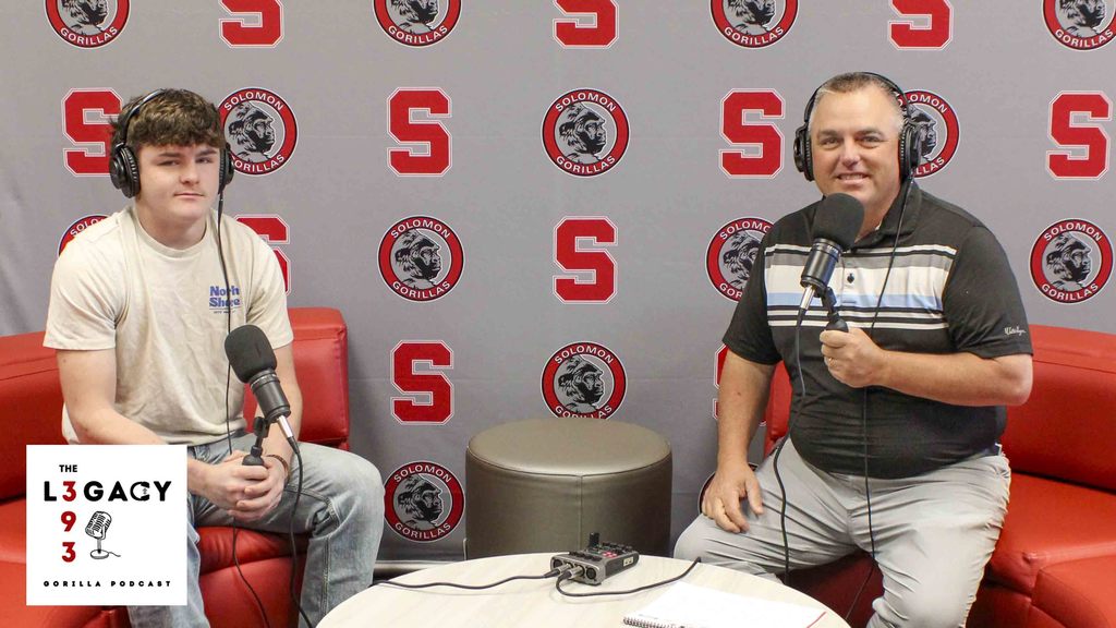 Senior Boedi posing with Superintendent Coup for the 393 Legacy - a Gorilla Podcast