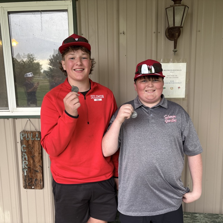Jordan and A’Den with their medals