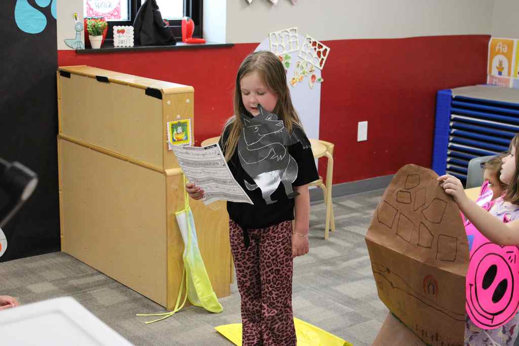 student playing the wolf posing for the camera
