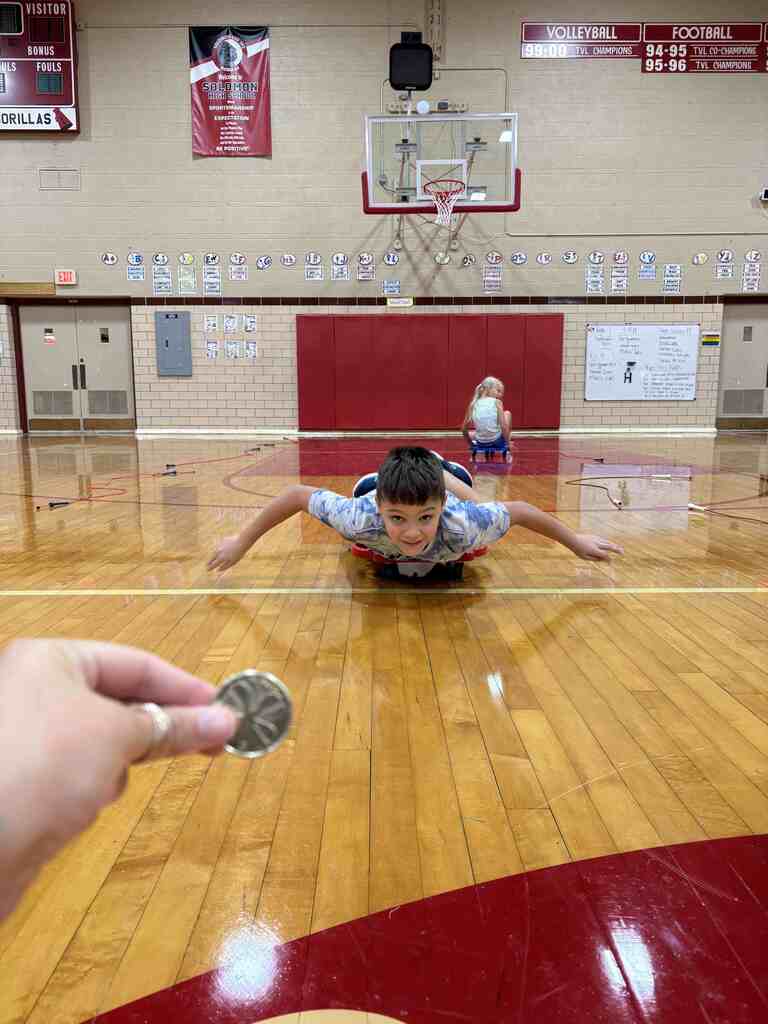 student 'floating' aka scooting to the camera