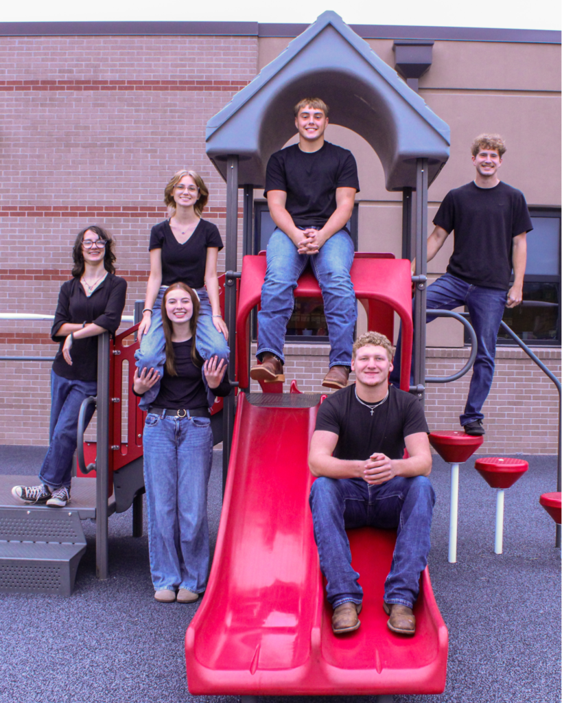 the homecoming candidates at different elevations on a playground set