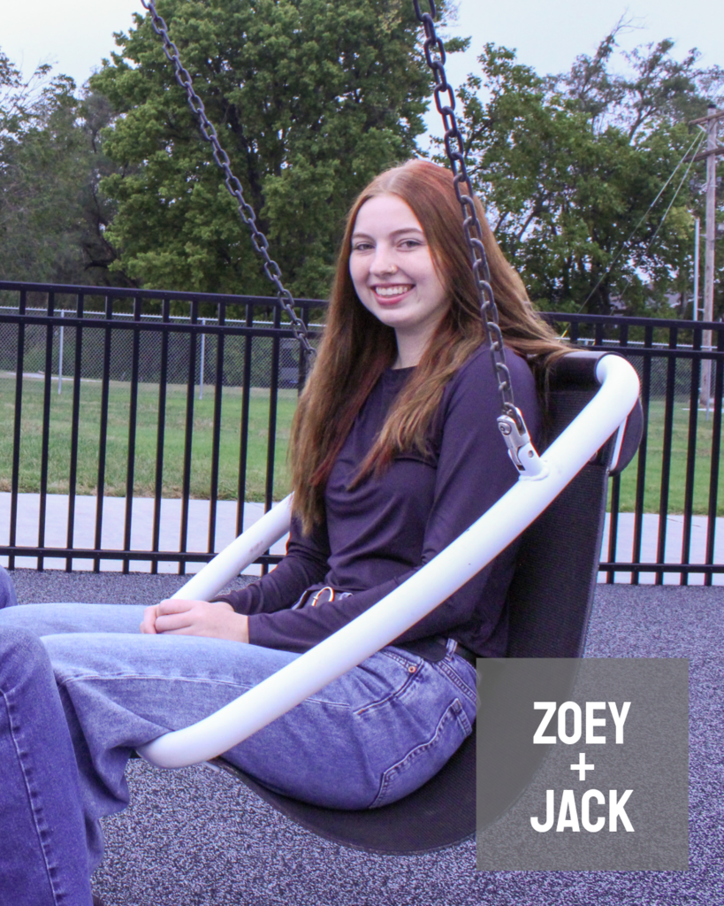 zoey walton sitting in a swing