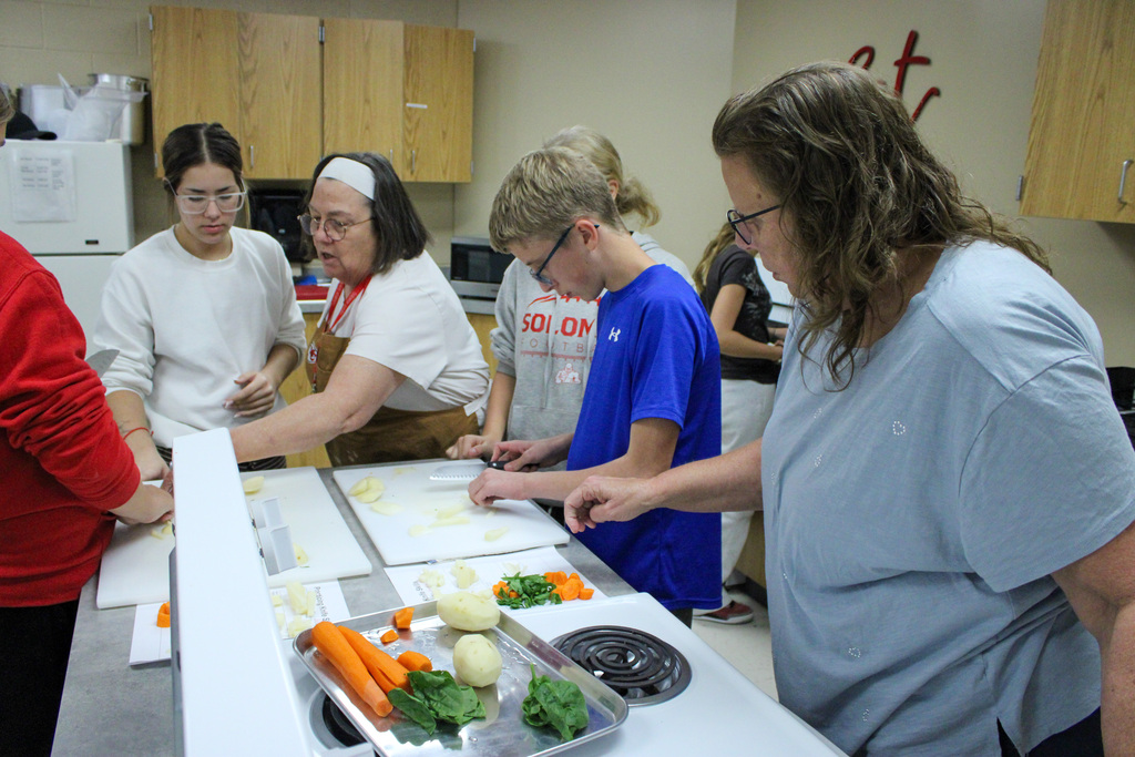 students practicing their cutting skills