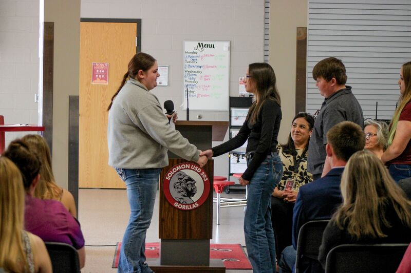 FBLA President swearing in newest member of FBLA