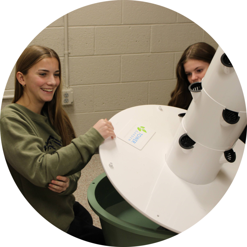 Myah and friend Zoey setting up unit