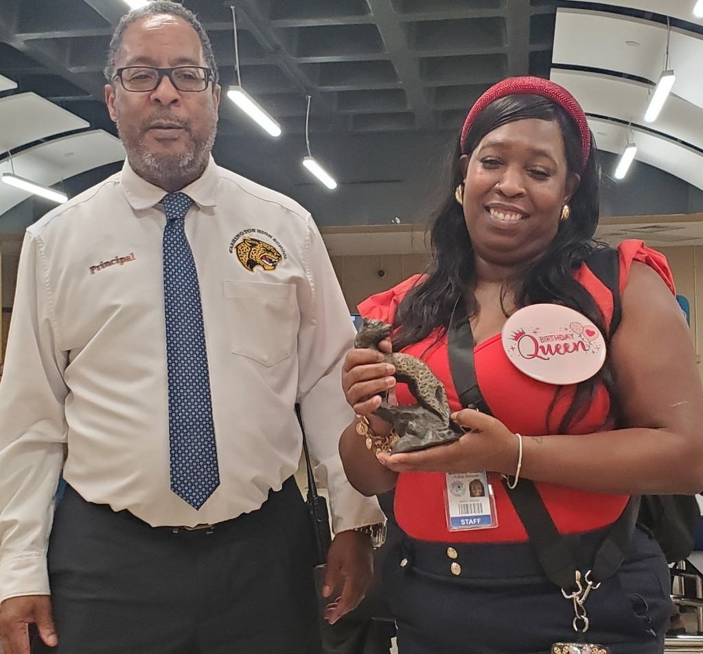 Ms James and Dr Owens with the Golden Jaguar award 👏