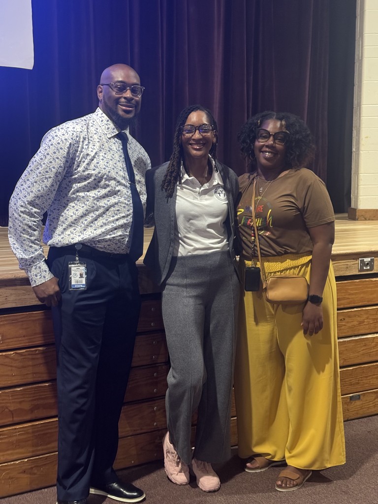 Crystal Young (in middle with members) of our Learning Support Team