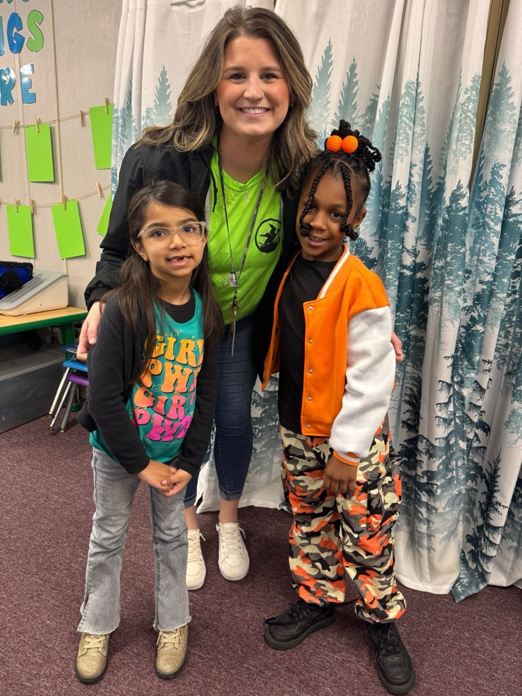 teacher and two girls