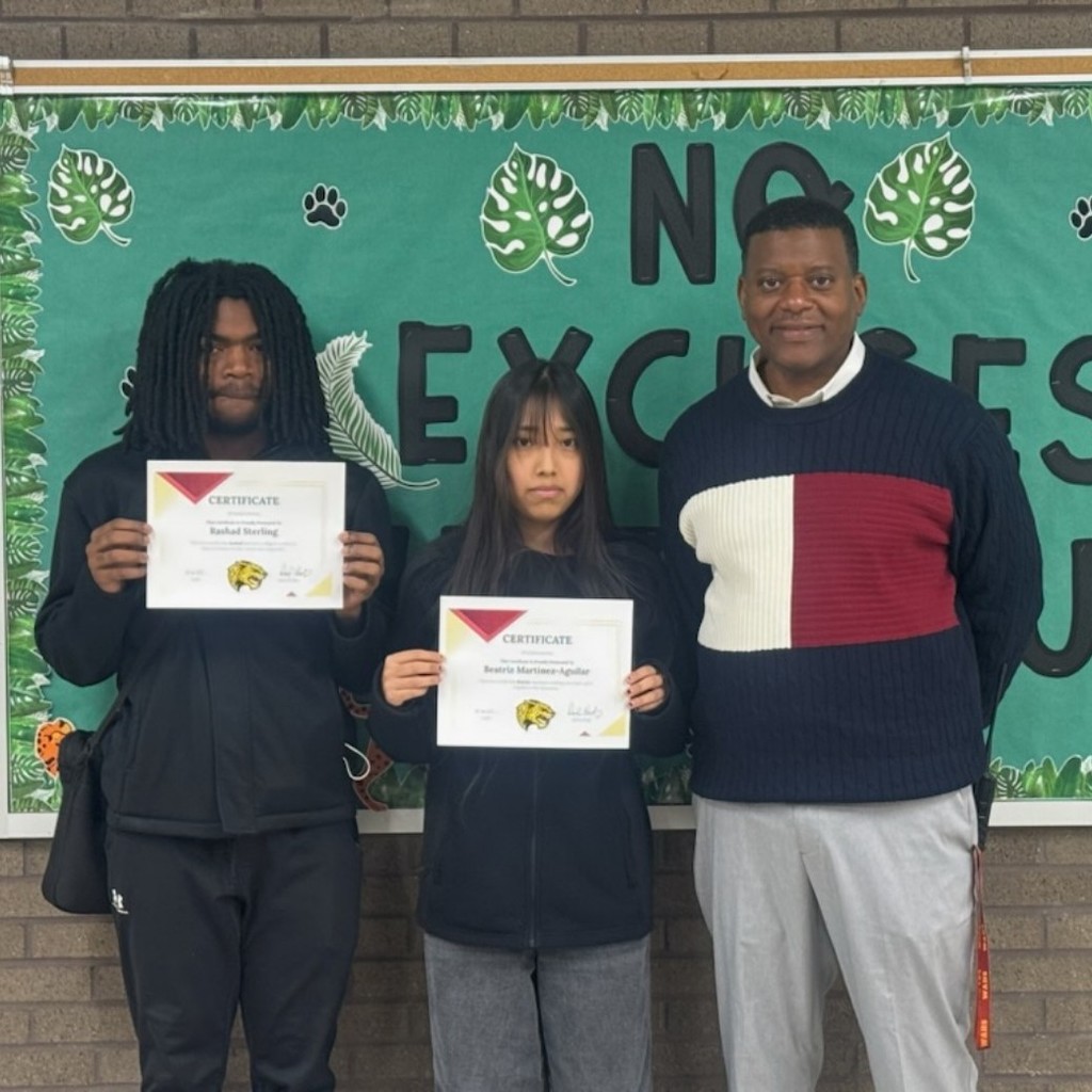 Students of the week, Rashad Sterling and Beatriz Martinez-Aguilar, pictured with the Dean of Students Mr. Edwards 