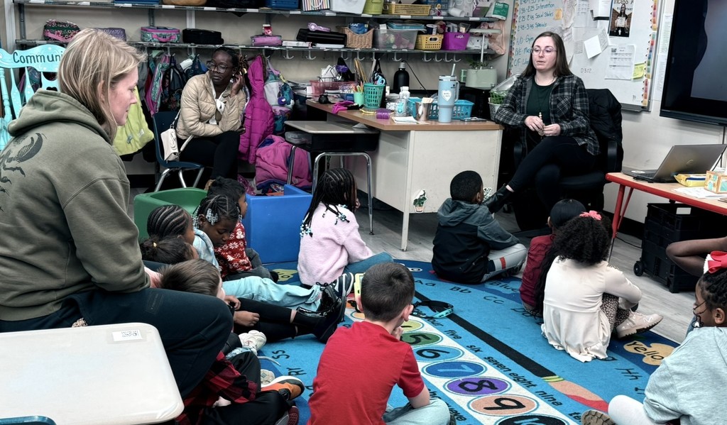 parents participating in a lesson in a classroom at Princess Anne Elementary School for American Education Week 2025