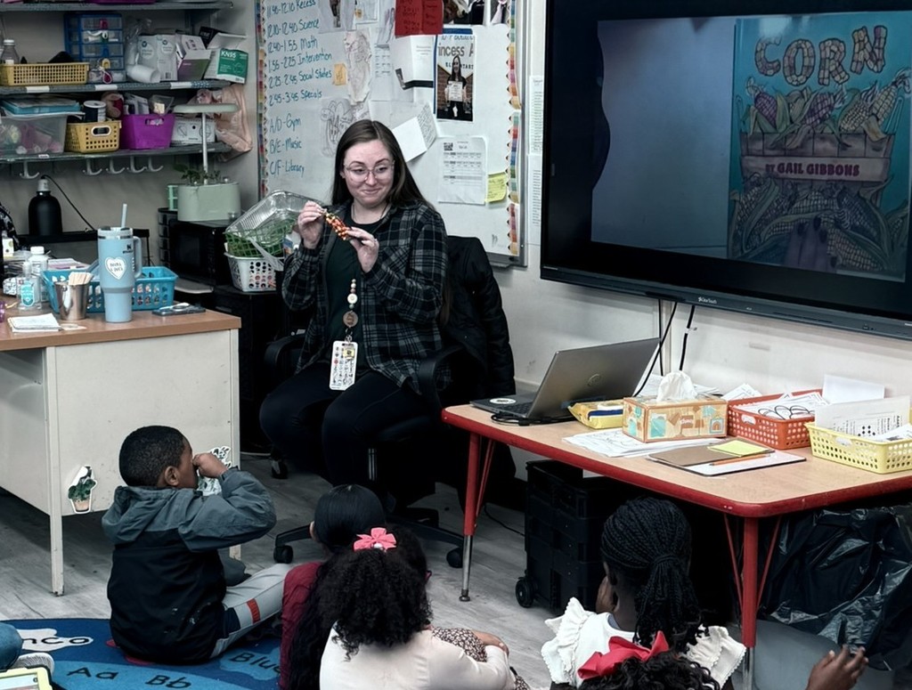 parents participating in a lesson in a classroom at Princess Anne Elementary School for American Education Week 2025