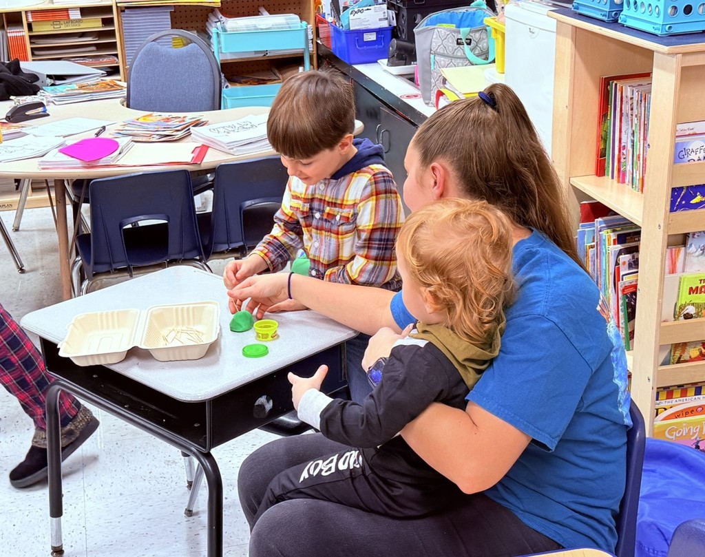 parents participating in a lesson in a classroom at Princess Anne Elementary School for American Education Week 2025