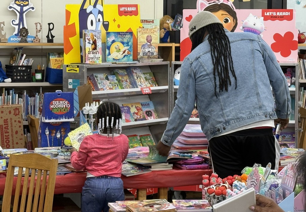 parents participating in a lesson in a classroom at Princess Anne Elementary School for American Education Week 2025