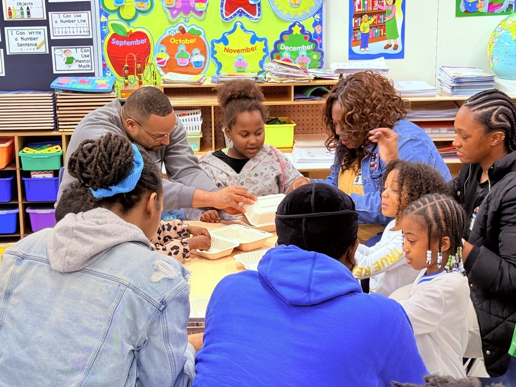 parents participating in a lesson in a classroom at Princess Anne Elementary School for American Education Week 2025