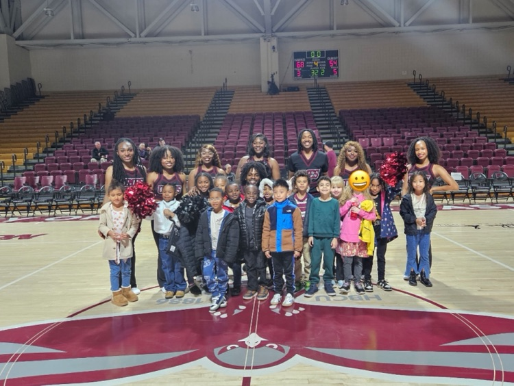 group of students on basketball court