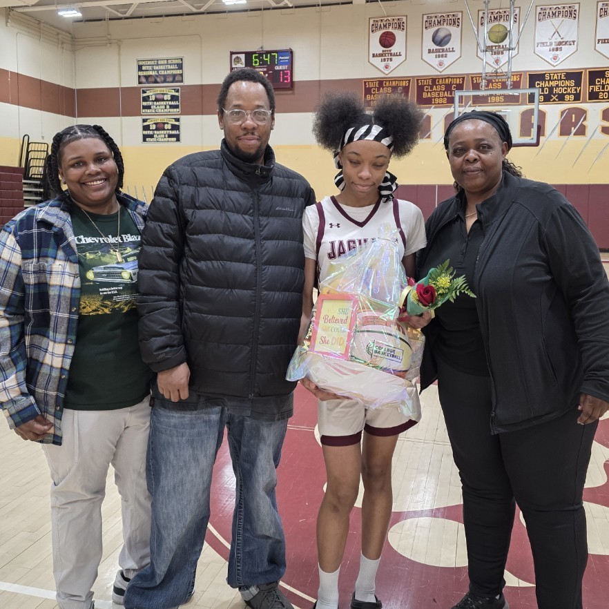 Tashira Ballard and Uncle with her coaches 
