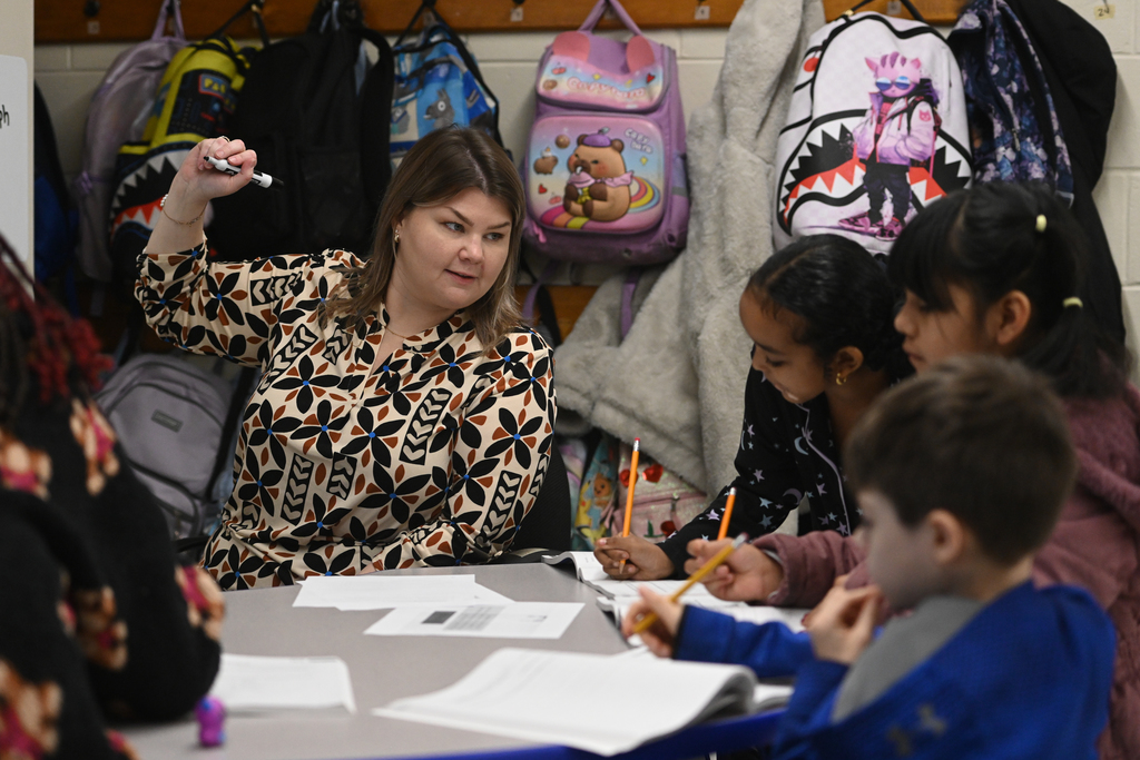 Images of Greenwood Elementary School's 2026-2027 Teacher of the Year, Ms. Carly Evans & her classroom of students.