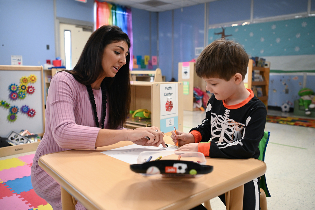 Classroom photos of Paige Stevens, Deal Island Elementary Teacher of the Year and students .