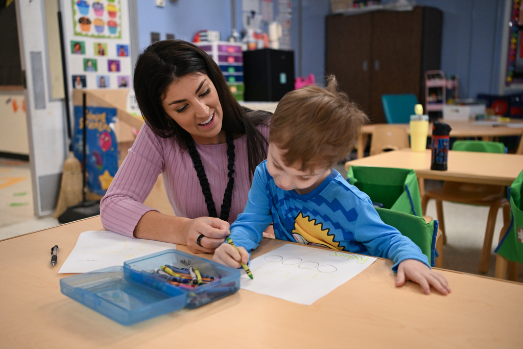 Classroom photos of Paige Stevens, Deal Island Elementary Teacher of the Year and students .