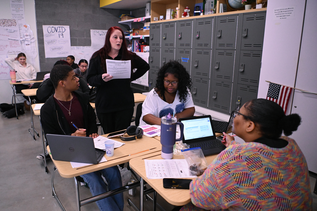 Classroom images of Somerset County Technical High School Teacher of the Year, Angelisa Hosfield, with students.