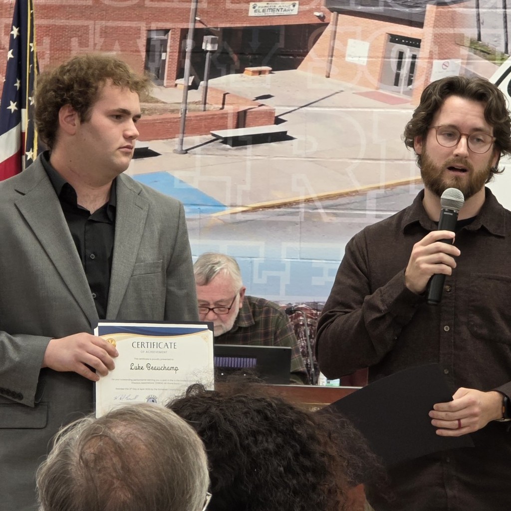 Luke being introduced by Band Teacher Colin Denton 