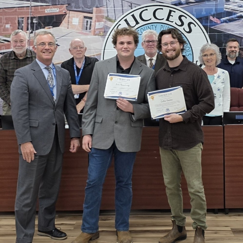 Luke with BOE members and the Superintendent 